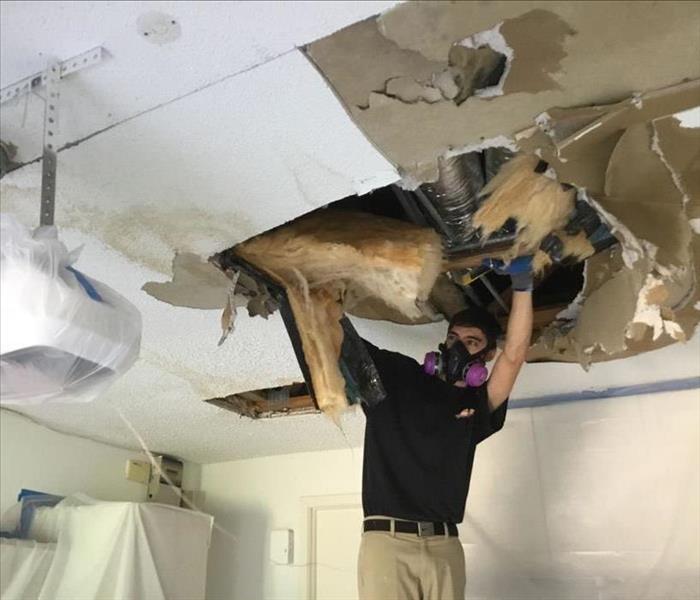 Ceiling collapse in a Delray Beach home due to a leak and heavy rains